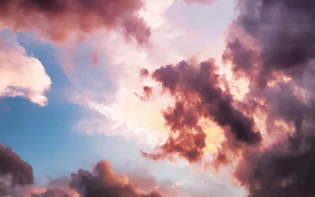 down angle photography of red clouds and blue sky